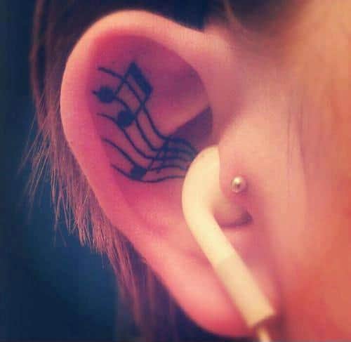 Music symbols behind the right ear